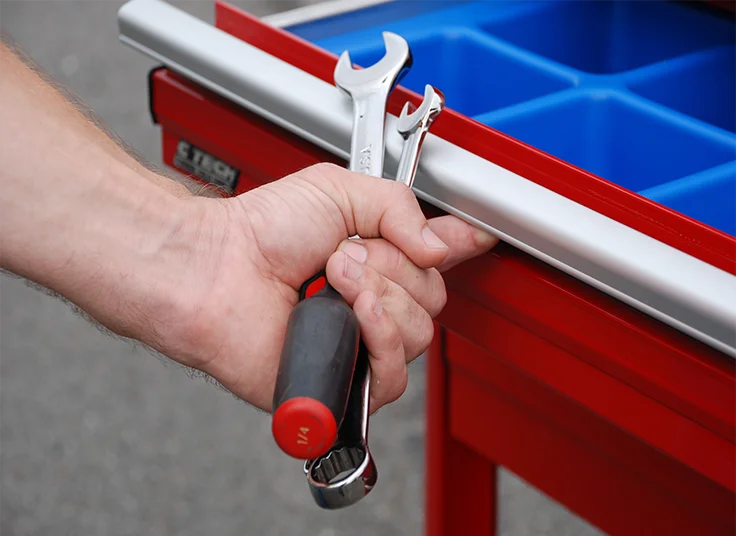 Hand with Tools Opening MotionLatch Drawer